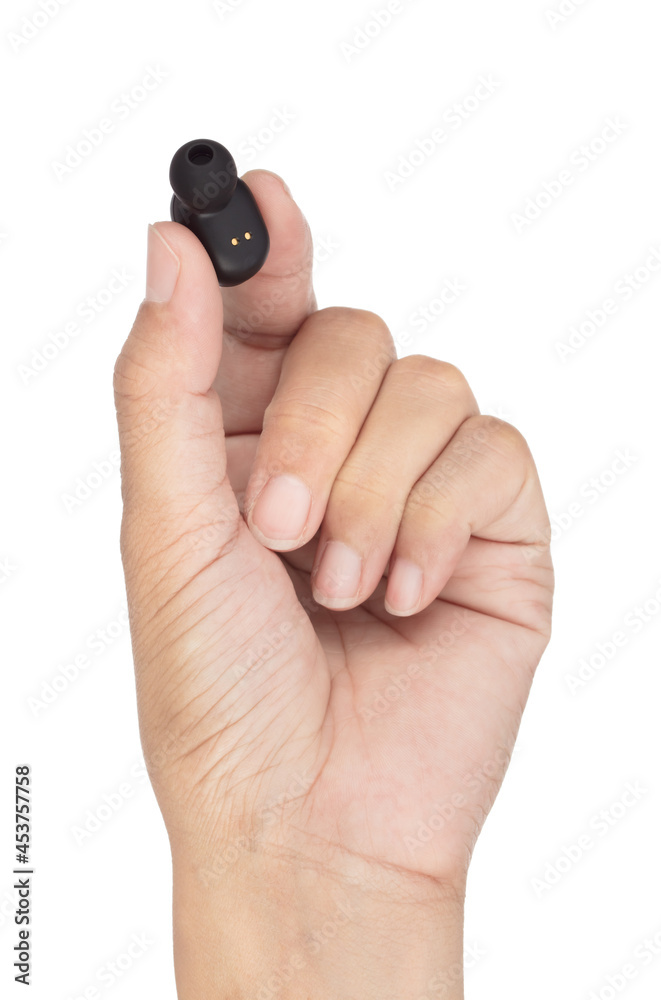 Hand holding In ear headphone bluetooth wireless isolated on white background Hand holding In ear headphone bluetooth wireless isolated on white background