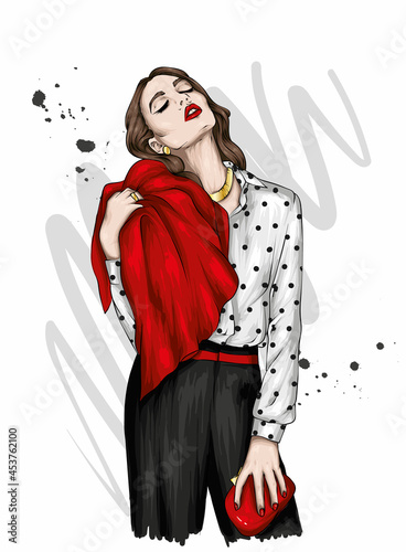 Beautiful girl in stylish clothes. Blouse and trousers, fashion and style.