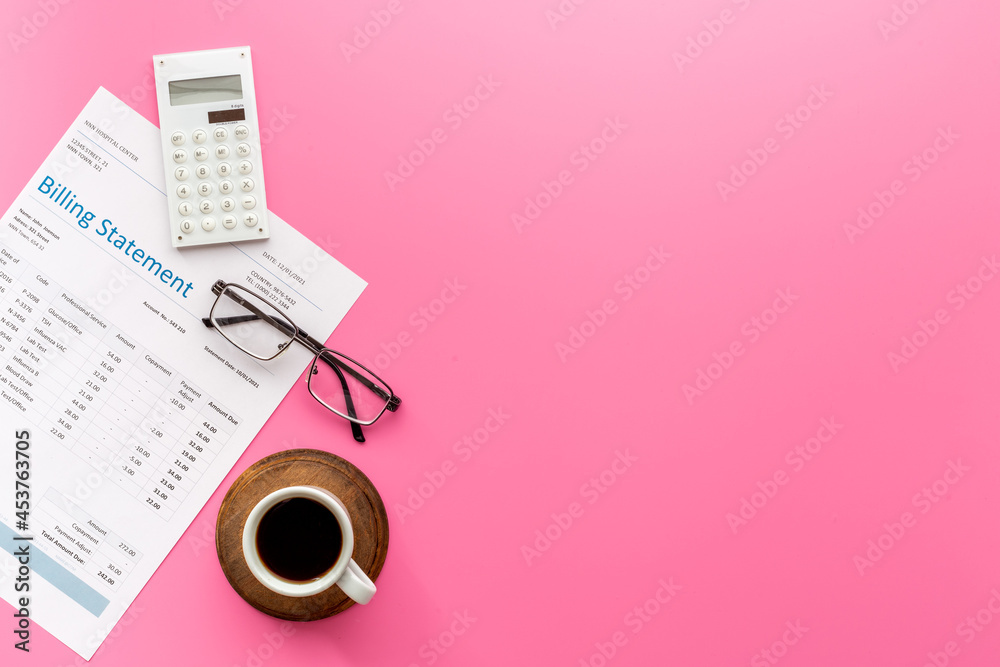Calculator on financial medical billing statement