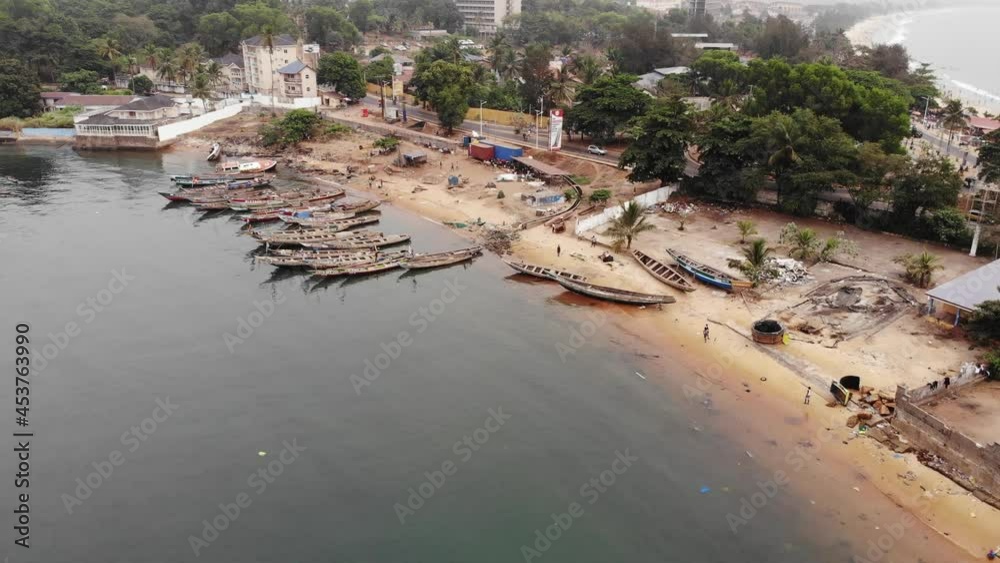 Aerial View Wooden African fishing boats on the shore of the ocean bay. Aerial View Wooden African fishing boats on the shore of the ocean bay.