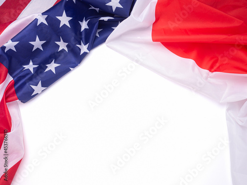 Part of America and Japanese flag isolated on white background. Top view. International relations photo