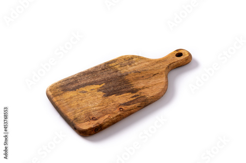 Wooden cutting board isolated on white background photo