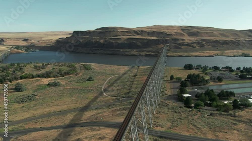 Aerial: Joso High Bridge, a railway bridge crossing the Snake river. In the background is Lyons Ferry State Park, Washington, USA photo