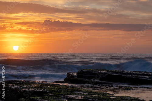 Bright orange Sunrise over Turimetta Beach on the Northern Beach of Sydney, NSW, Australia  © Em Neems Photography
