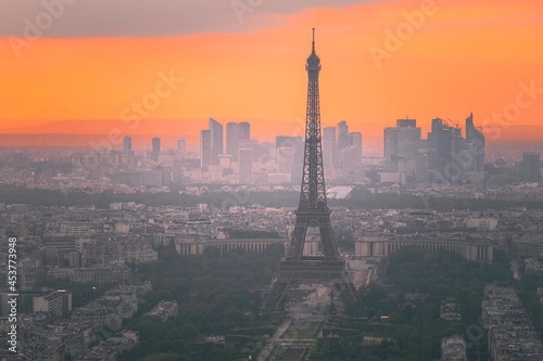 View from montparnasse tower at sunset over the city streets of Paris, France © Em Neems Photography