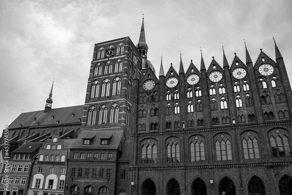 Black and white photo of the famous town hall of Stralsund with the St. Nikolai church
