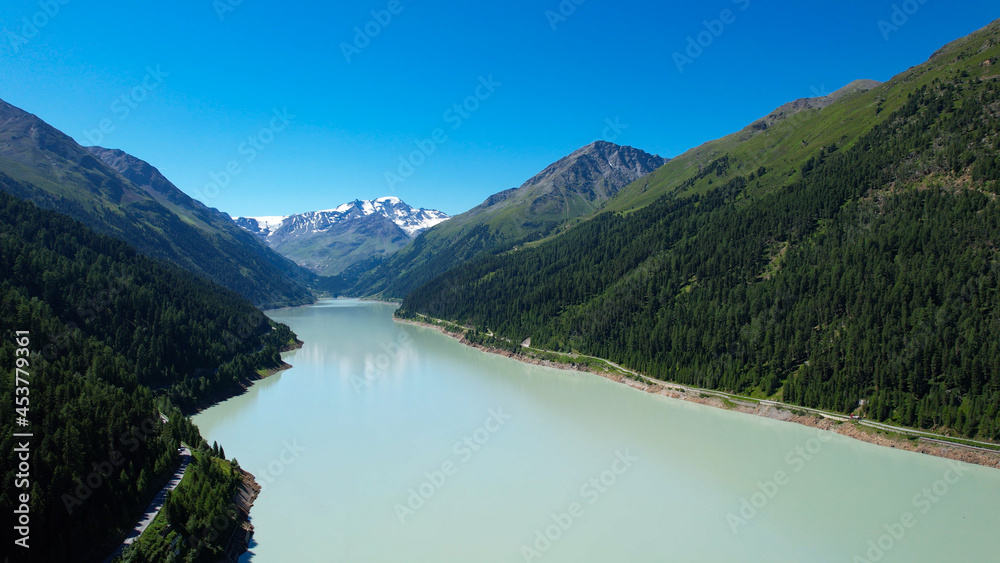 Beautiful lake at Kaunertal Valley in Austria - aerial view - travel photography by drone