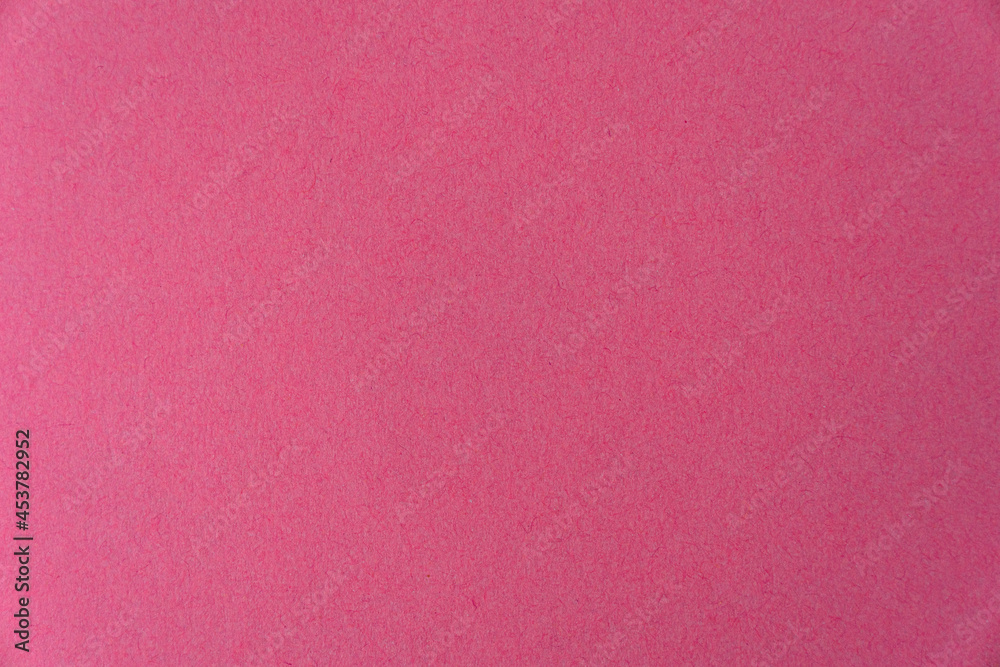 Fototapeta premium Kraft pink cardboard paper texture background