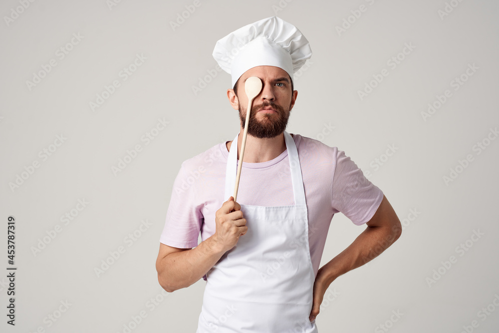 male chef in white apron professional kitchen work male chef in white apron professional kitchen work