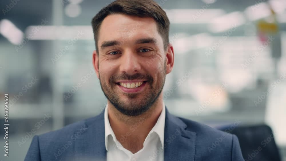 Portrait of a Confident Happy Businessman Wearing a Casual Suit, Looking at Camera, Genuinely and Charmingly Smiling. Successful Experienced Man Working in Diverse Company Office.