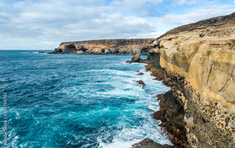Yellow cliffs around the beautiful blue coast of Ajuy, Fuerteventura