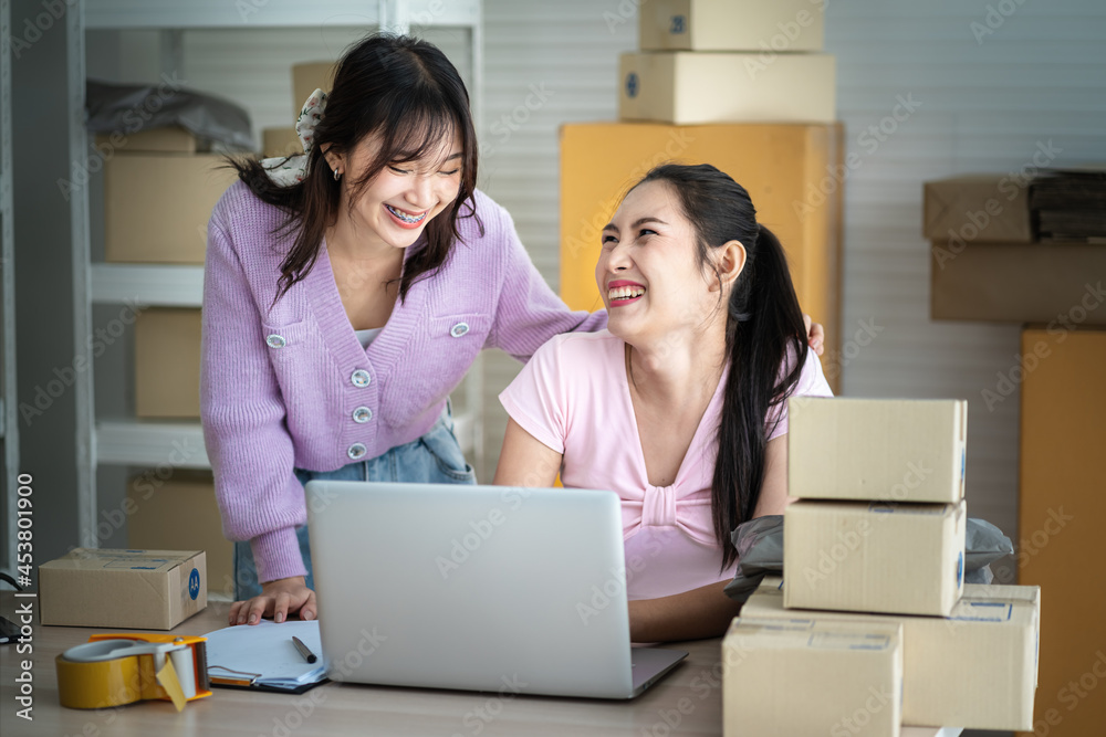 Transgender women and friend are selling clothes online through laptops,The concept of coexistence in society Transgender,Lgbt,LGBTQ Transgender women and friend are selling clothes online through laptops,The concept of coexistence in society Transgender,Lgbt,LGBTQ