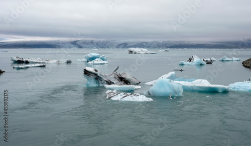 Jokulsarlon Glacier Lagoon in Iceland with icebergs and clear water © lensw0rld