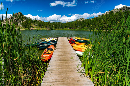 Fototapeta Naklejka Na Ścianę i Meble -  Kayaks docked at the lake pier in Custer state park, South Dakota, USA