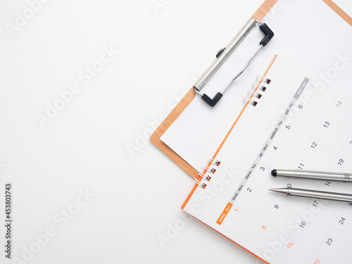 Wallpaper Mural Close up pen on calendar with document board on the table top view isolated copy space Torontodigital.ca