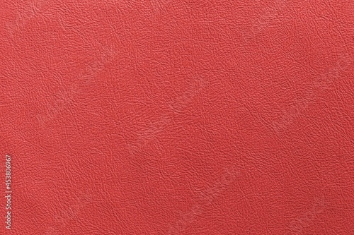 Red genuine cow leather of the sofa texture and background seamless