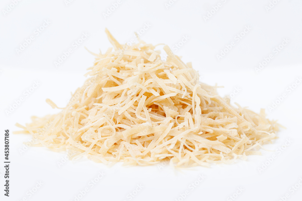 Heap Of Uncooked Chopped Noodles Isolated On White Background. Side View.