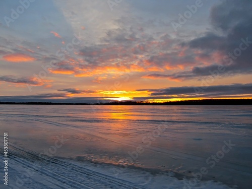 Sunrise at frozen lake Simcoe, Ontario, Canada