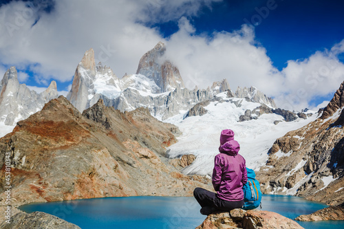 Advanture traveler enjoy the view of Fitz Roy Mountain, Patagonia, Argentina. Mountaineering sport lifestyle concept © olyphotostories