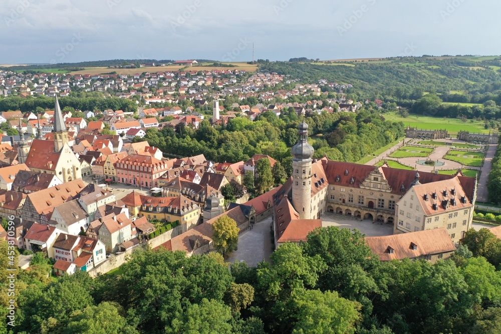 Aerial drone shot of the Cityscape of Weikersheim, Germany featuring its famous castle and church