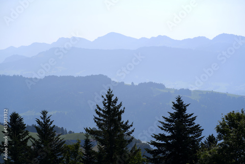 Beautiful scenic mountain panorama seen from local mountain Pfänder on a sunny summer day. Photo taken August 15th, 2021, Bregenz, Austria.