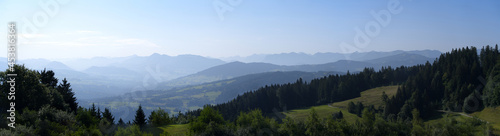 Beautiful wide angle scenic mountain panorama seen from local mountain Pf  nder on a sunny summer day. Photo taken August 15th  2021  Bregenz  Austria.