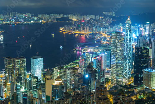Victoria Harbor of Hong Kong city at night © leeyiutung