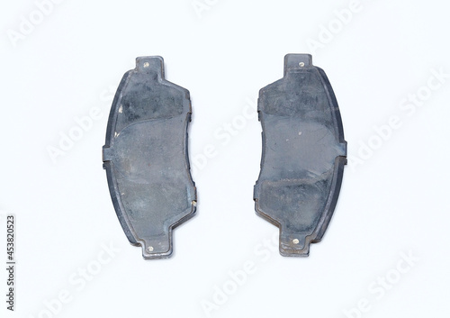 Car brake pads have been used isolated on white background