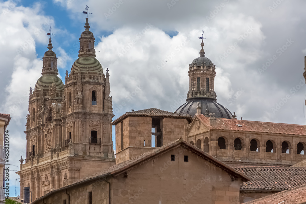 View at the baroque iconic top front facade and cdome copula at the La Clerecía building, Pontifical university at Salamanca (UPSA)