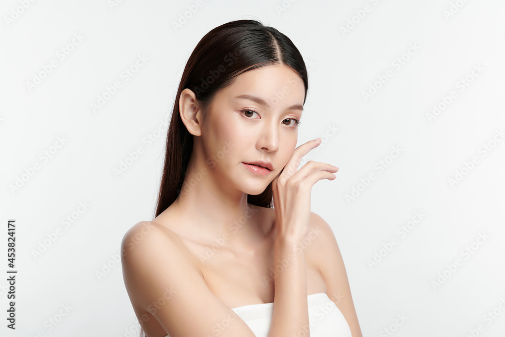 Beautiful young asian woman with clean fresh skin on white background, Face care, Facial treatment, Cosmetology, beauty and spa, Asian women portrait. Beautiful young asian woman with clean fresh skin on white background, Face care, Facial treatment, Cosmetology, beauty and spa, Asian women portrait.