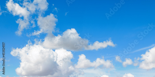 White clouds on the blue sky  background