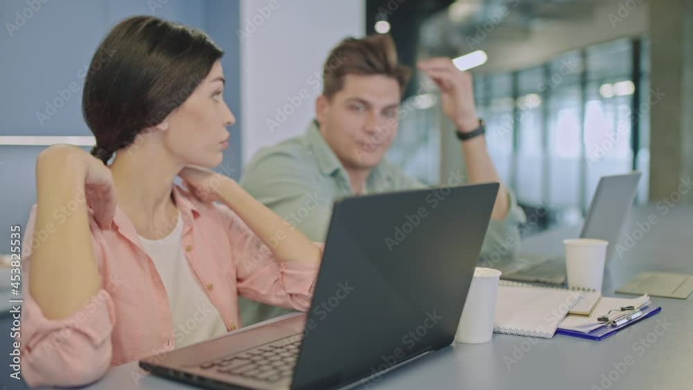 Company managers thinking about solution, working on laptop together, business Company managers thinking about solution, working on laptop together, business