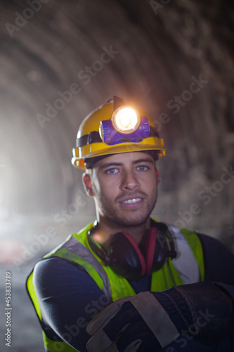 Worker using walkie-talkie in tunnel © KOTO