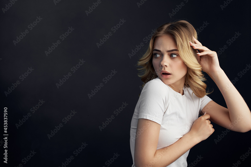 woman in white t-shirt glamor posing bright makeup woman in white t-shirt glamor posing bright makeup