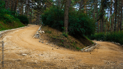 A crossroads in the mountains. A person's choice of where to go up or down? To the right or to the left?
