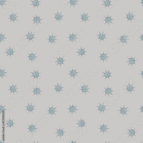 Seamless pattern in pastel tones with random little ship wheel ornament. Grey background. Marine style.