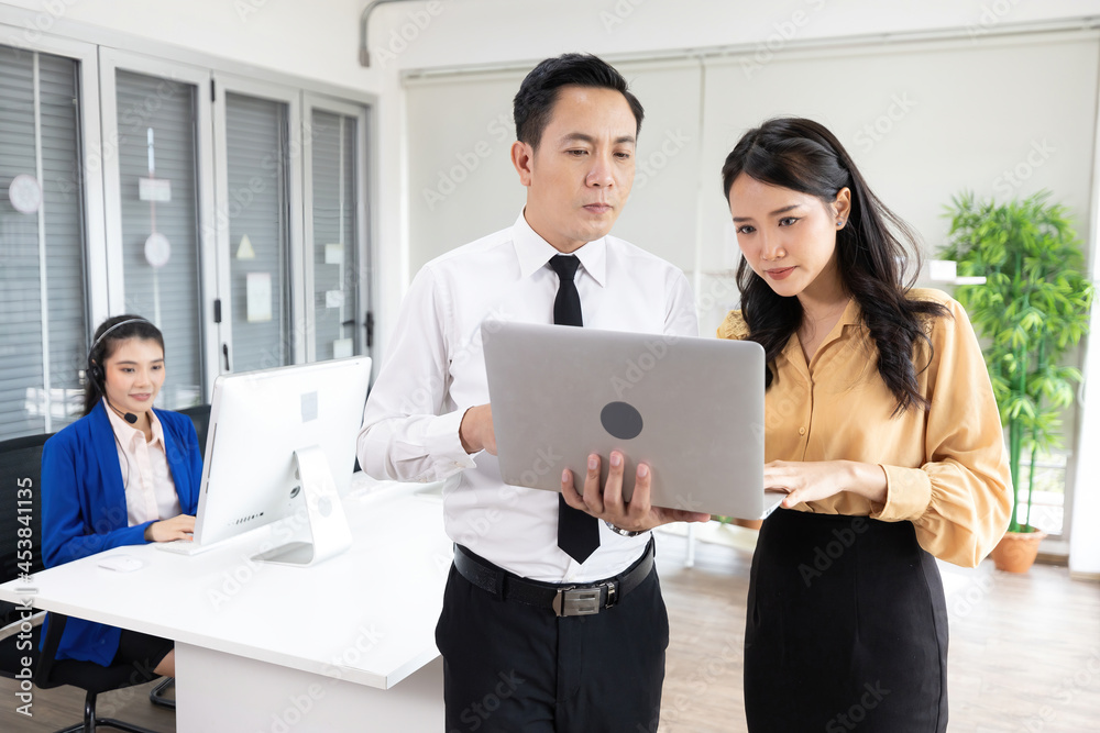 portrait man and woman operator wearing headphones and holding laptop computer for working at call center service portrait man and woman operator wearing headphones and holding laptop computer for working at call center service