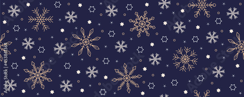 christmas seamless snowflake and star background on blue