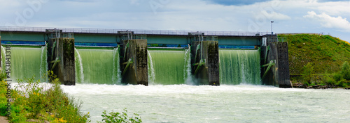 Canvas-taulu open flood gates at the power plant thaling on the river enns in upper austria