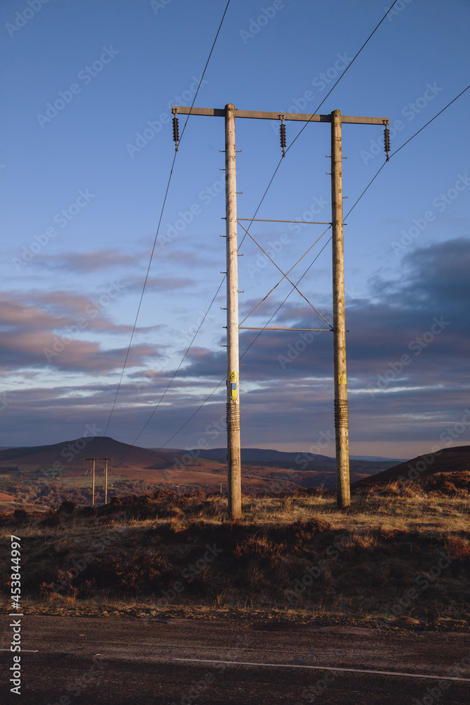 Sunrise Welsh landscape with telegraph pole Sunrise Welsh landscape with telegraph pole