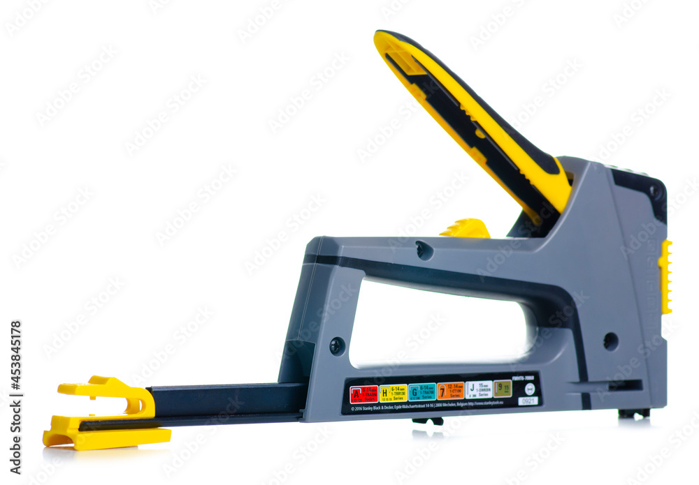 Fototapeta premium Construction stapler gun work tool on white background isolation