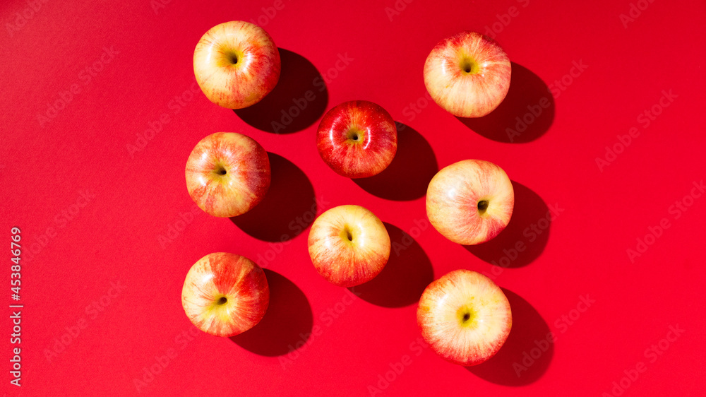 Large fresh red apple on red background gala schnico brookfield mema