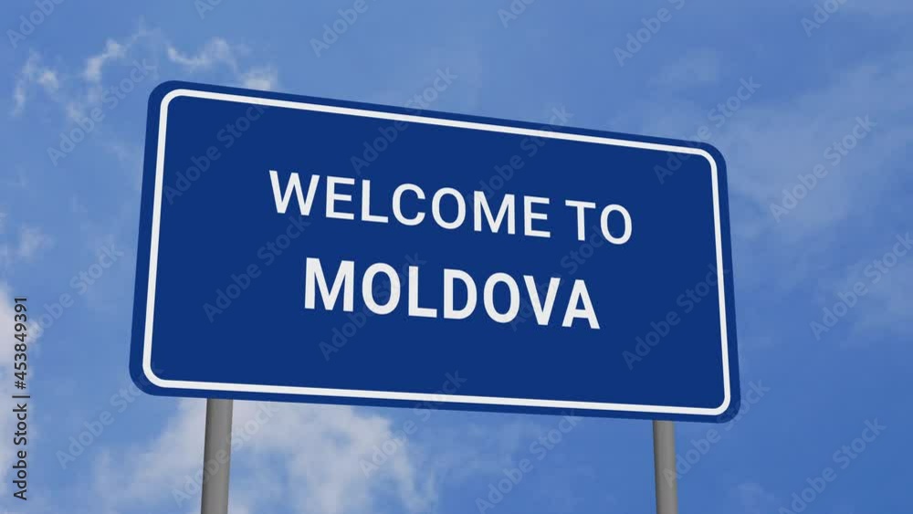 Welcome to Moldova Road Sign on Clear Blue Sky with Rapid Moving Clouds Welcome to Moldova Road Sign on Clear Blue Sky with Rapid Moving Clouds