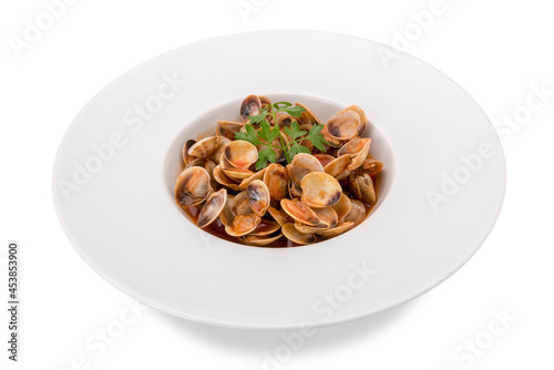 Clams with tomato sauce with parsley sprig in white plate isolated on white