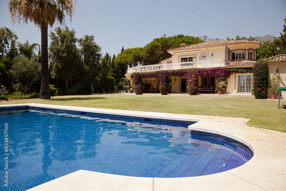 Luxury lap pool and villa