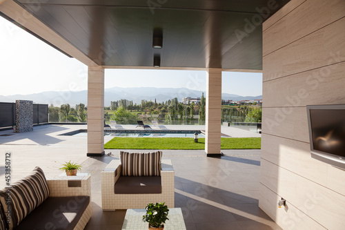 Sofa and television on luxury patio