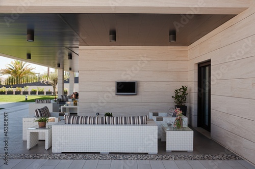 Sofa and television on luxury patio
