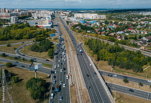 An expressway with a streetcar line in the middle of the road.. Kazan, Russia. 