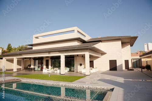 Luxury lap pool and villa © KOTO