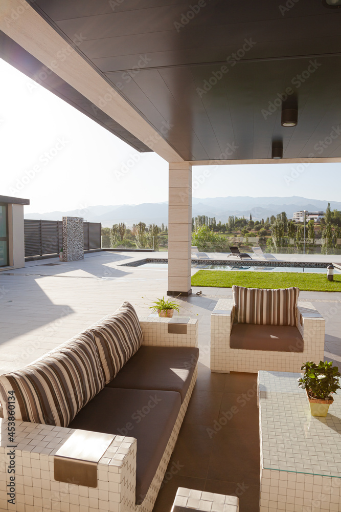 Fototapeta premium Sofa and chairs on luxury patio